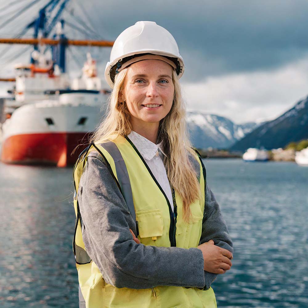 AI Image of an electro engineer standing in front of a ship